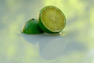 A vibrant lime slice with a playful artistic effect, symbolizing creativity and freshness.