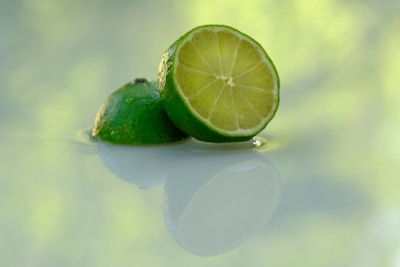 A vibrant lime slice with a playful artistic effect, symbolizing creativity and freshness.