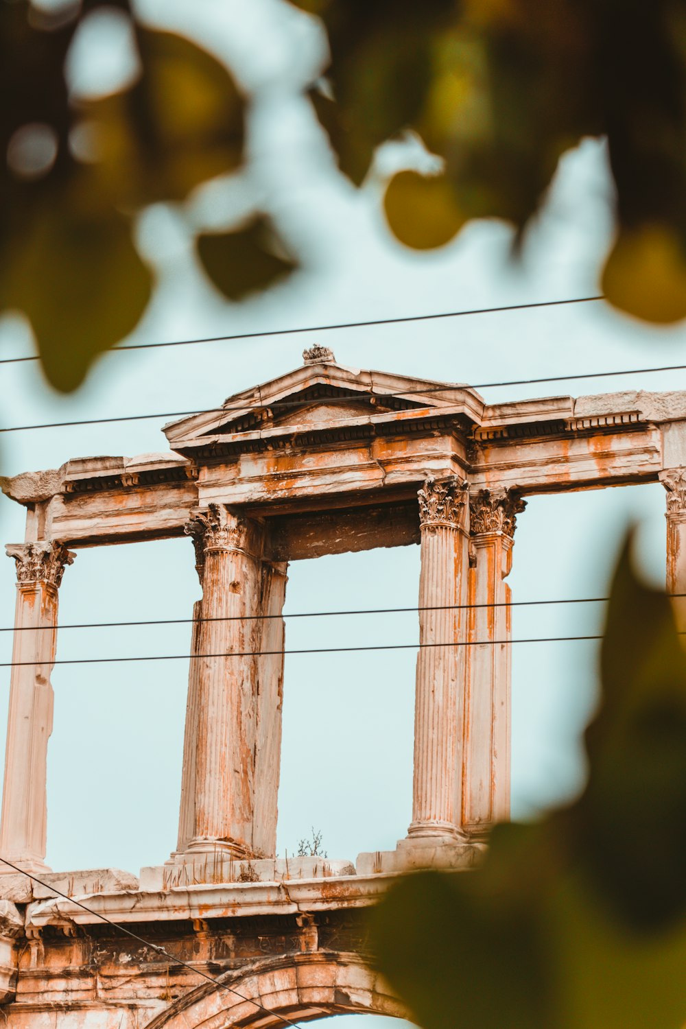 an old building with columns and a clock