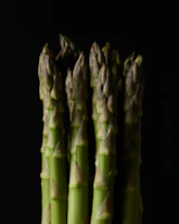 a close up of a bunch of asparagus
