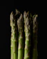 a close up of a bunch of asparagus