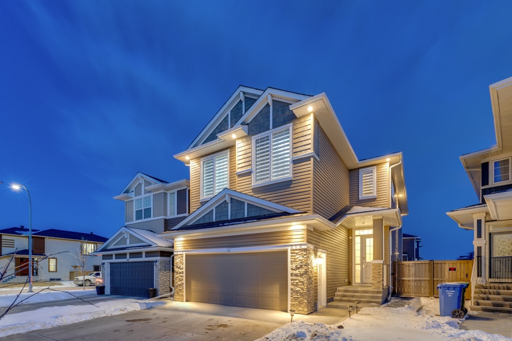 a house with a lot of snow on the ground