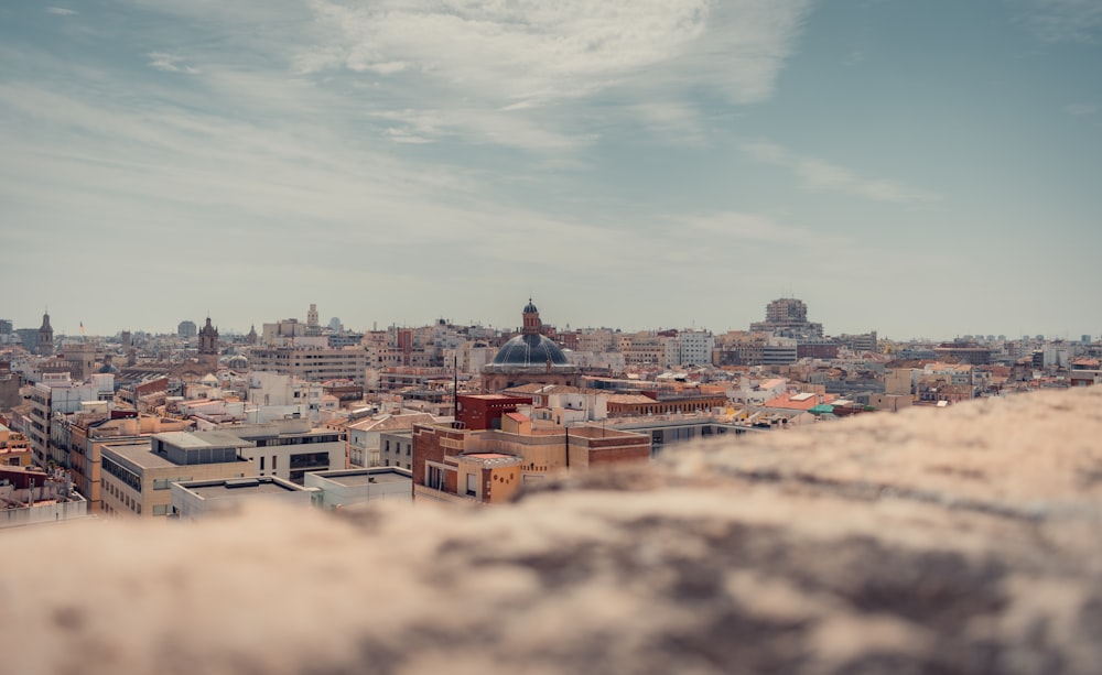 a view of a city from the top of a hill