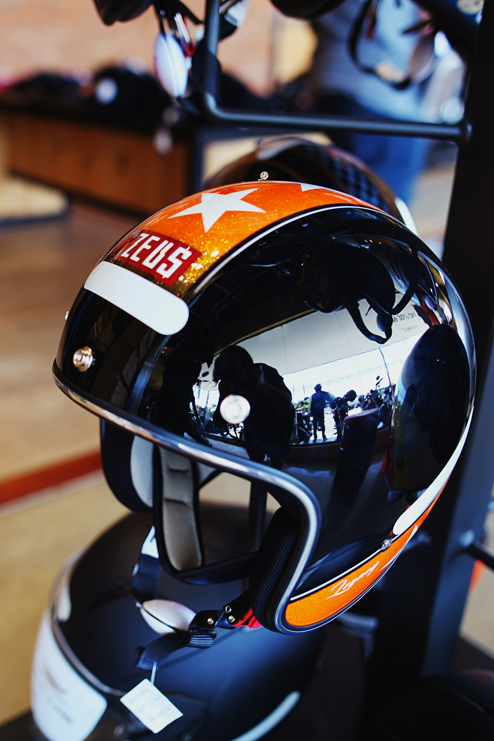 a helmet is sitting on a stand in a room