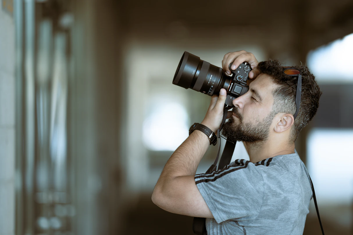 a man taking a picture with a camera