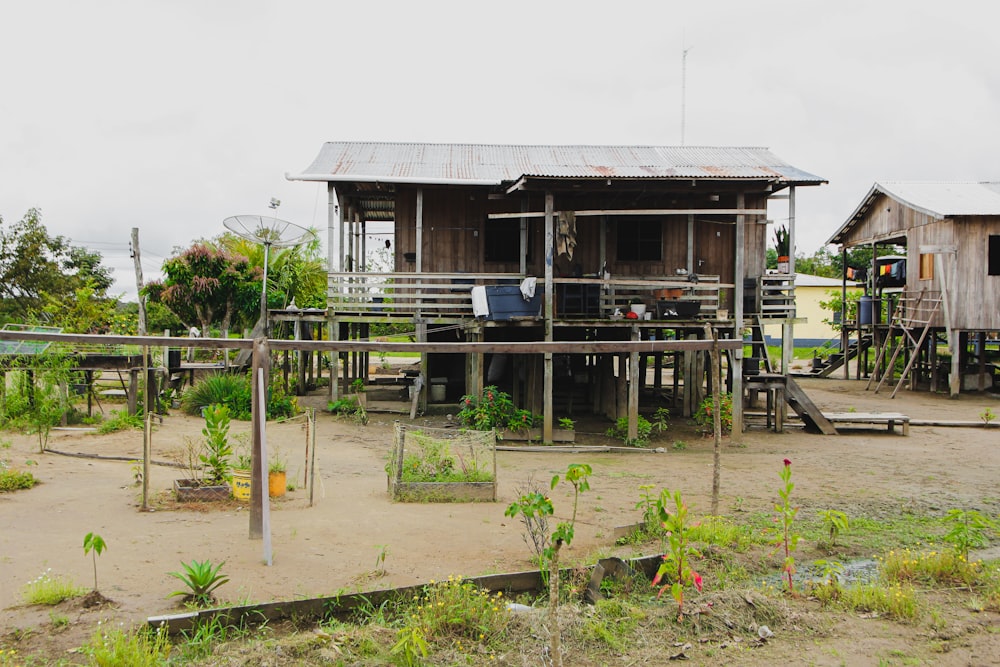 a small wooden house with a metal roof