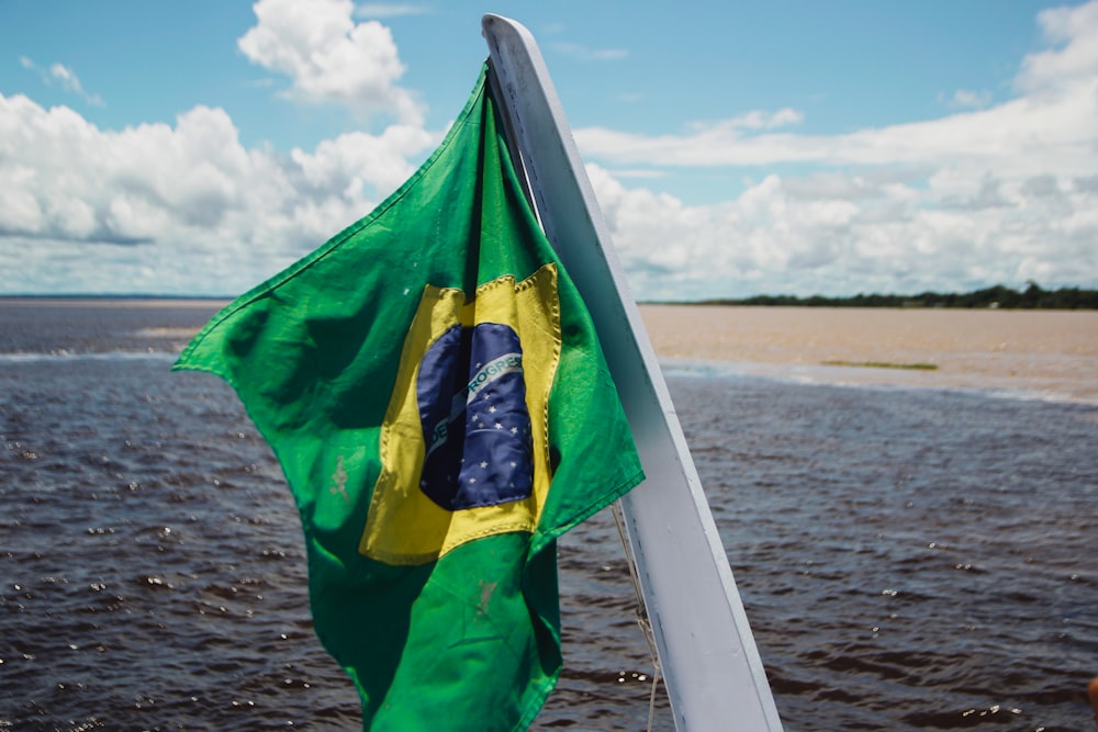 a flag on a boat in the water