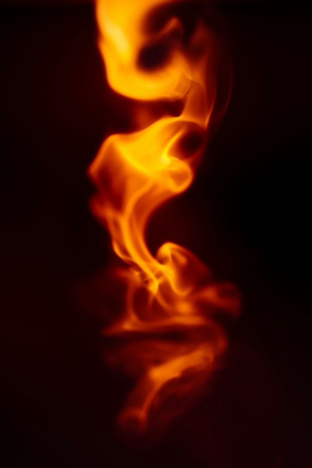 a blurry photo of a red and yellow fire