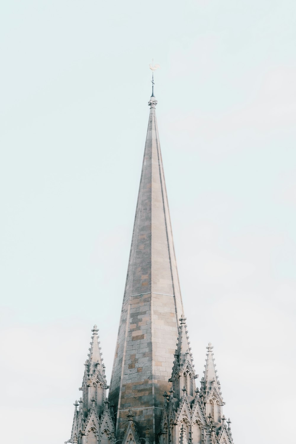 a tall tower with a clock on top of it