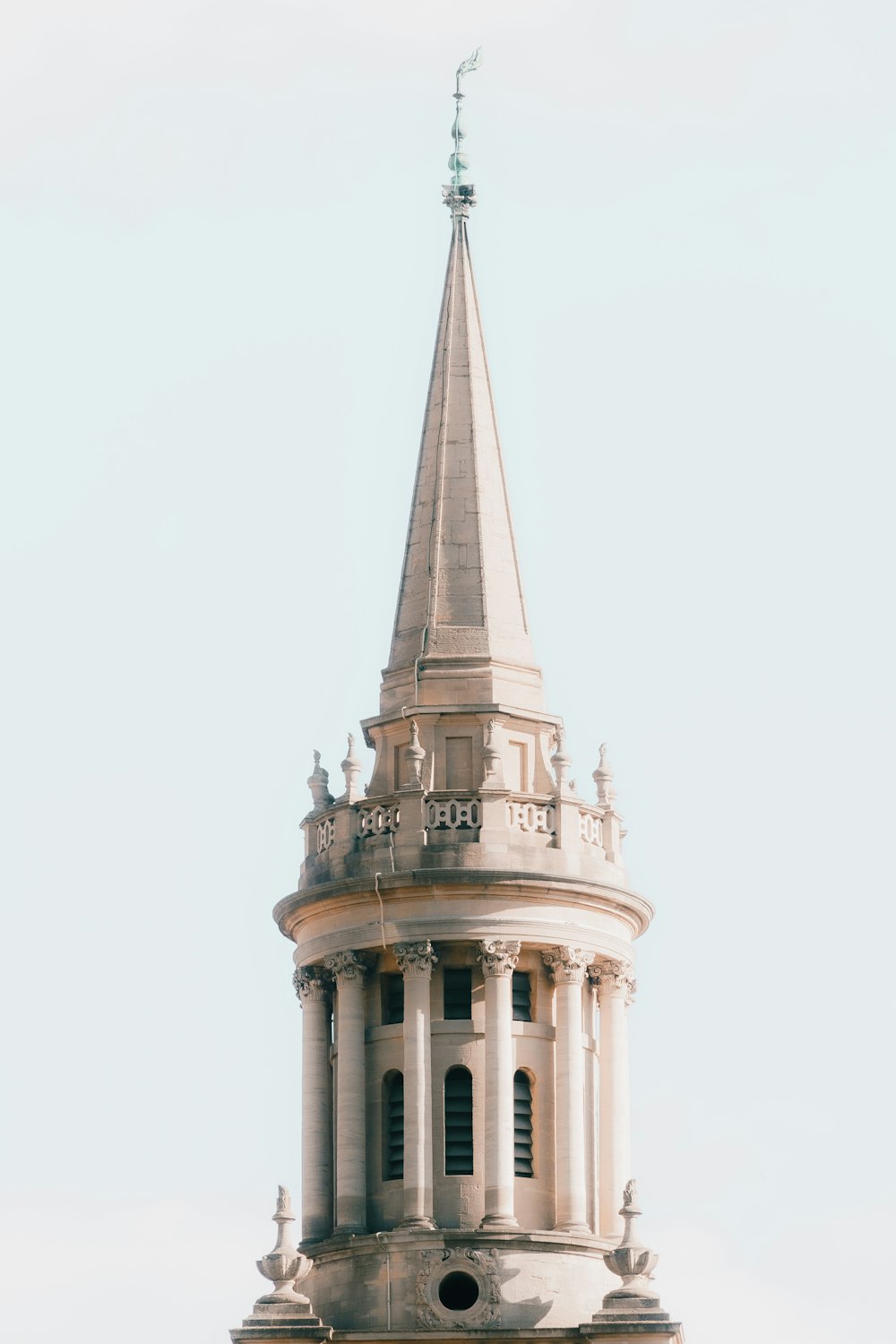 a tall tower with a clock on the top of it