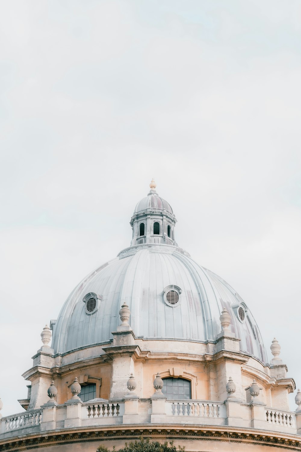 a large dome with a clock on top of it