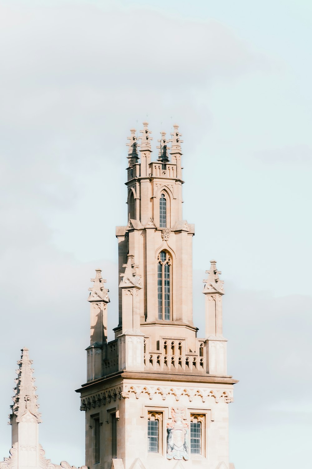 a tall tower with a clock on the top of it