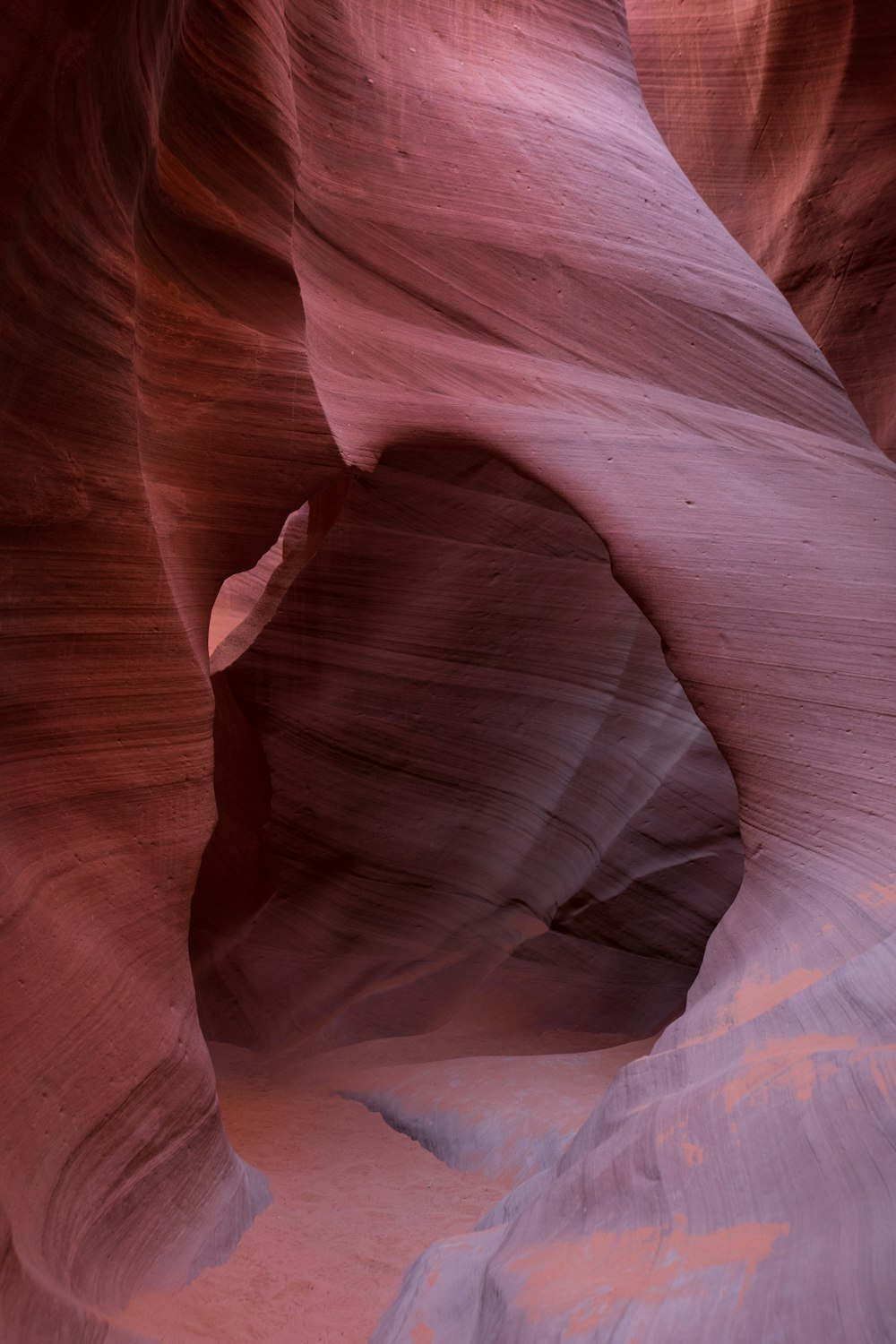 a narrow slot in the side of a canyon