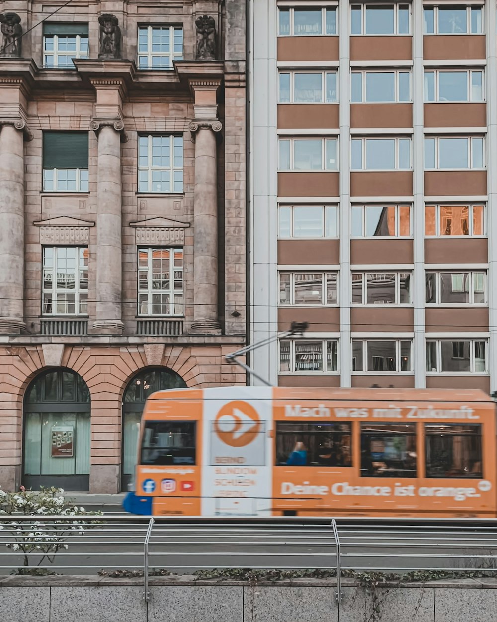 a train is parked on the side of a building