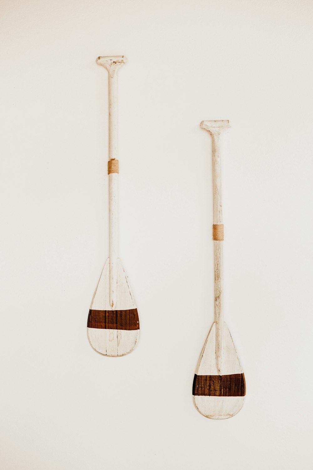a couple of wooden spoons sitting next to each other