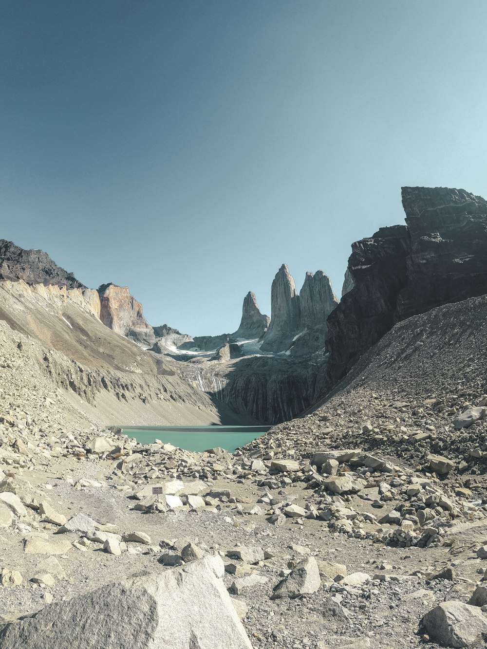 a mountain range with a lake in the middle of it