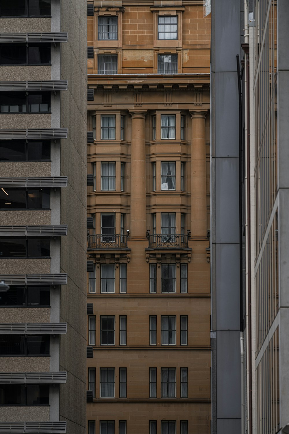 a tall building with a clock on the top of it