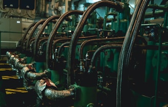 a row of pipes lined up in a factory