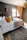 A cozy bedroom featuring bedding sourced from Nova Trade Sourcing.