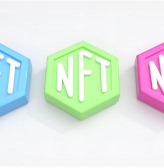 three different colored blocks with the letters nft and nft on them