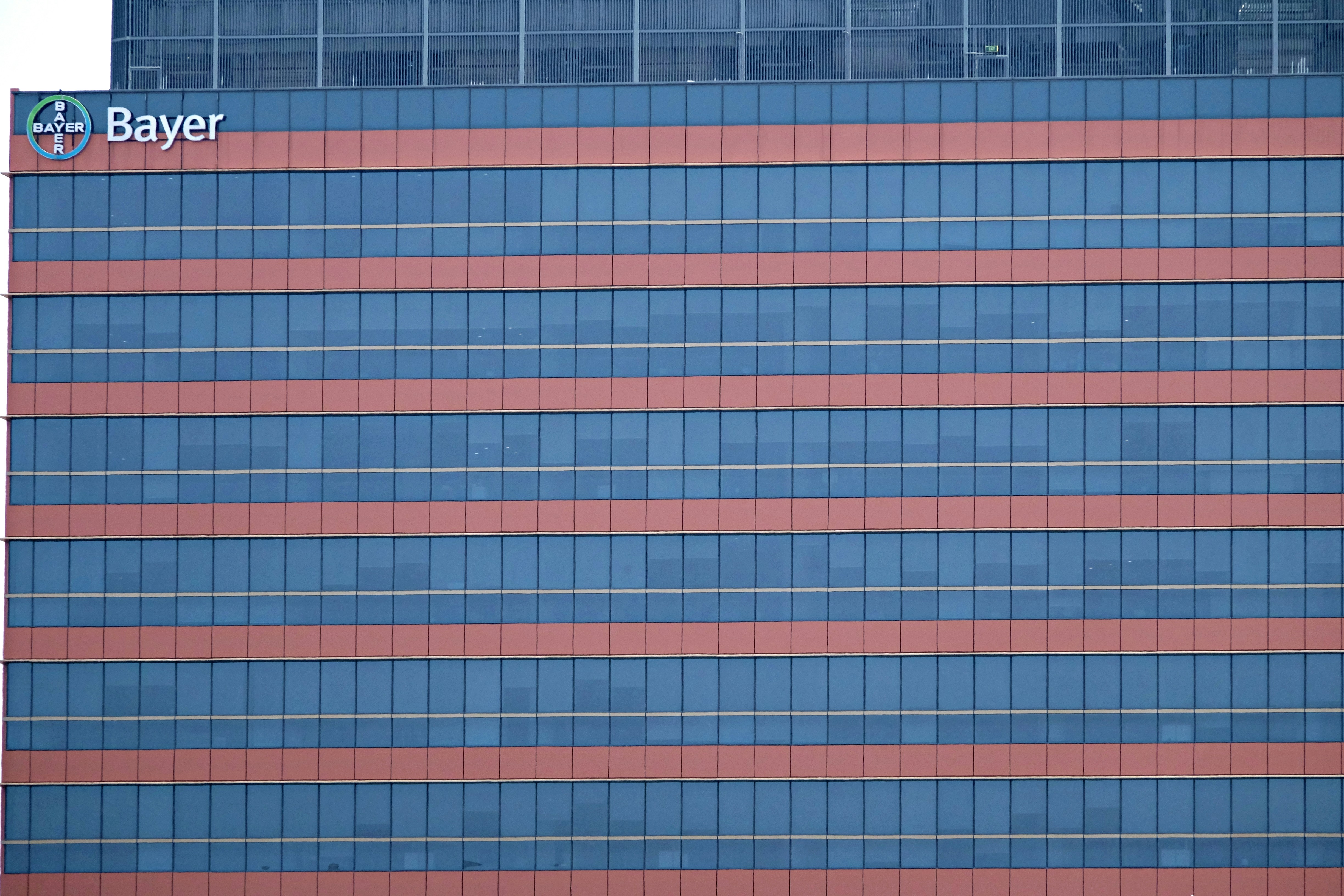 a tall building with a sign on the side of it