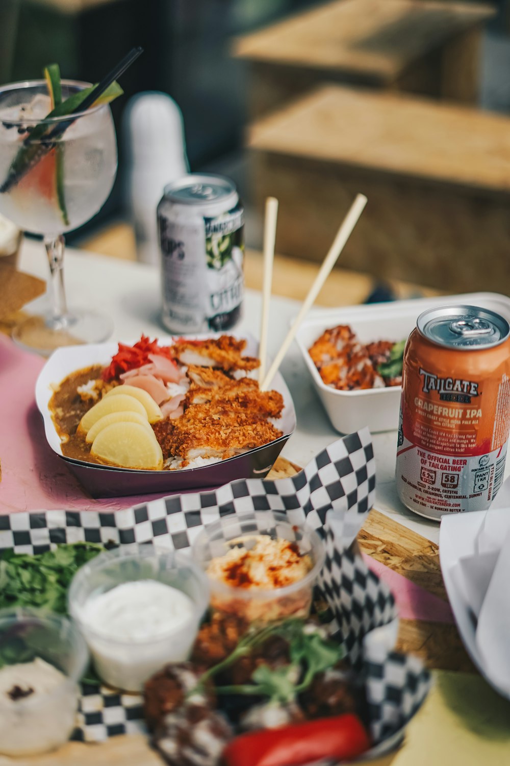 a table topped with plates of food and drinks