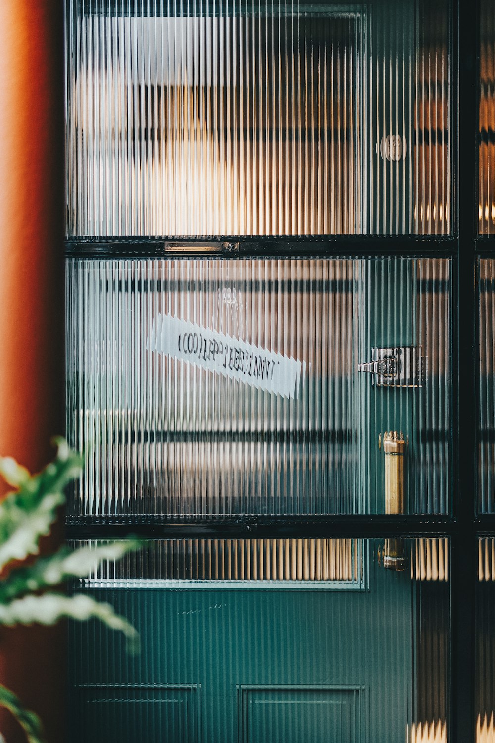 a close up of a shelf with a sign on it