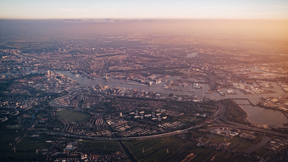 an aerial view of a city and a river