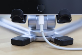 a close up of a device connected to a charger