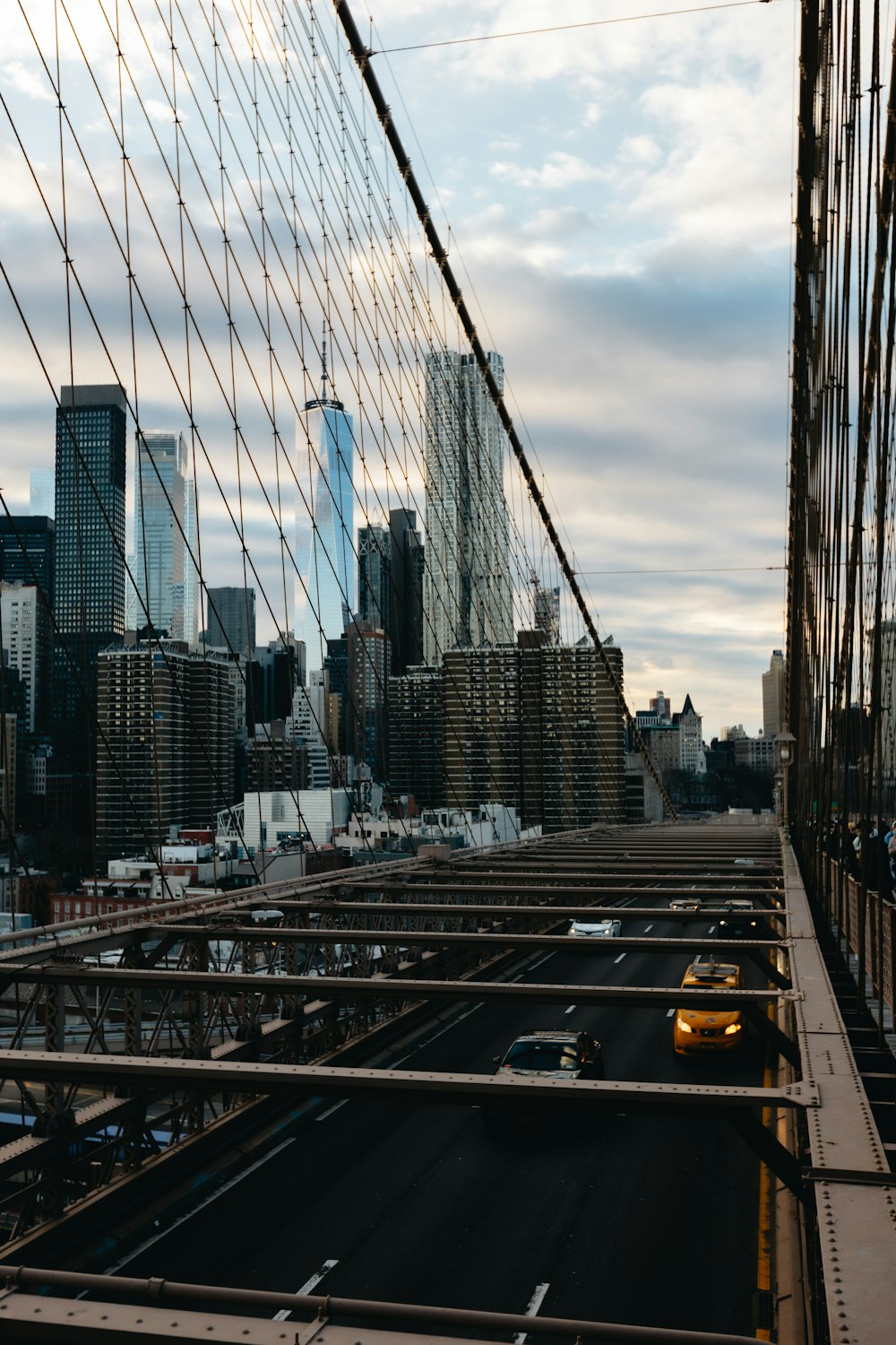 a view of a city from the top of a bridge