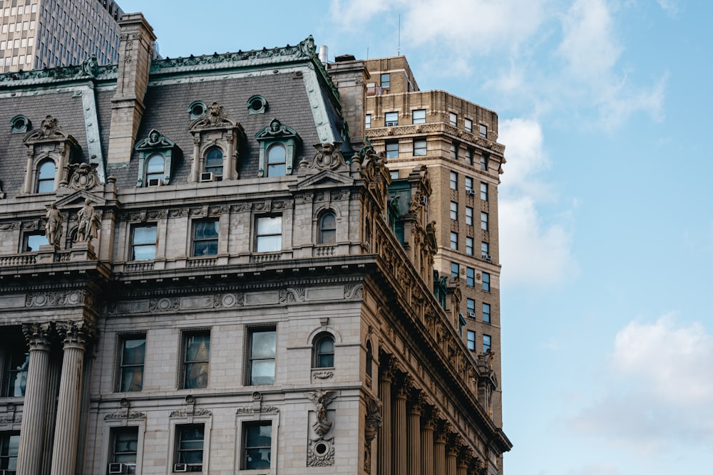 a tall building with a clock on the top of it