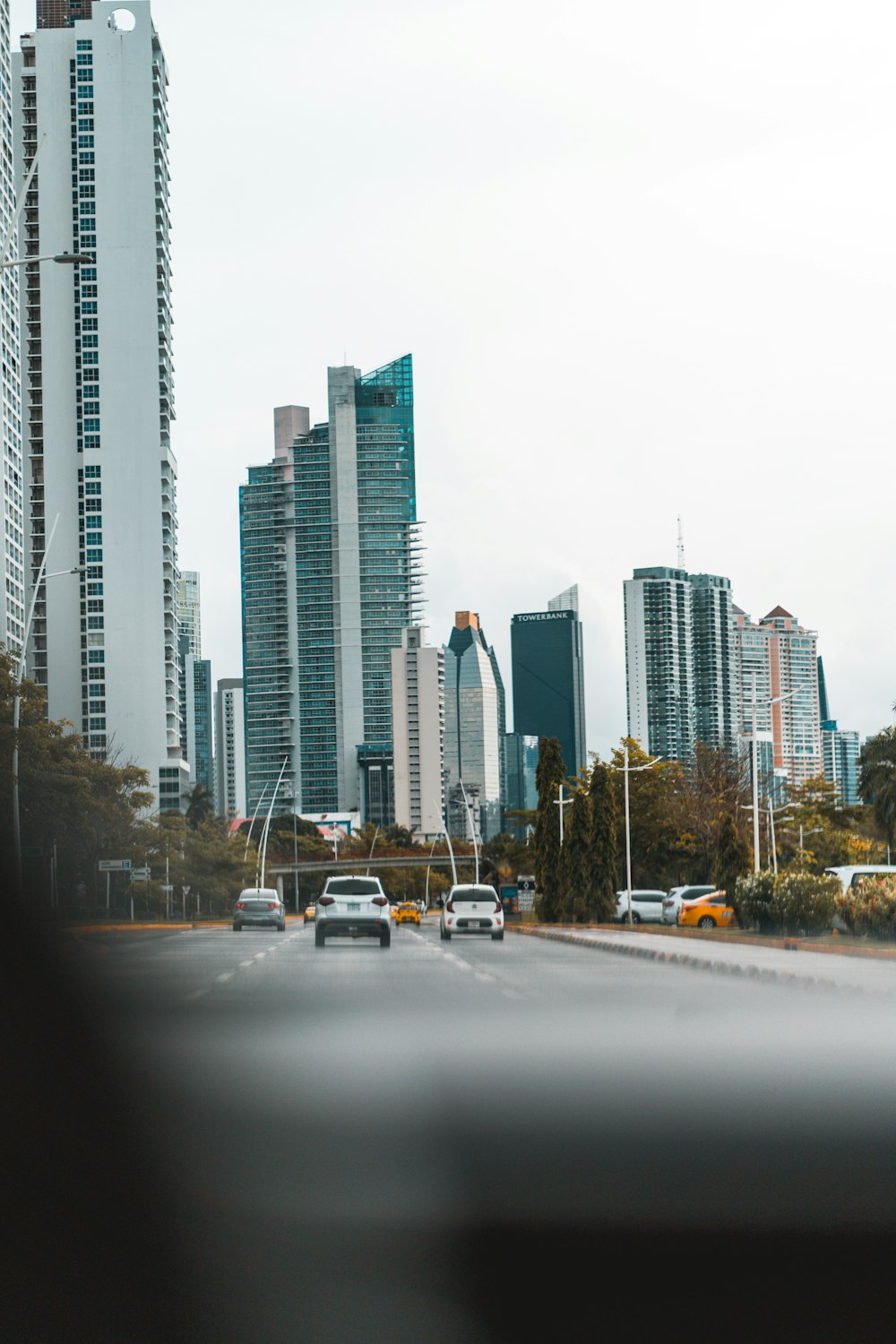 a view of a city from a moving vehicle