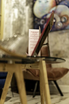 Close-up of a modern card UI displaying top-selling cafe menu items with vibrant accents.