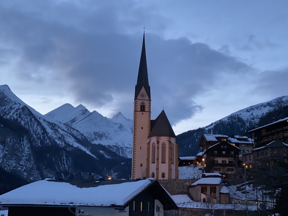 a church in the middle of a snowy mountain town