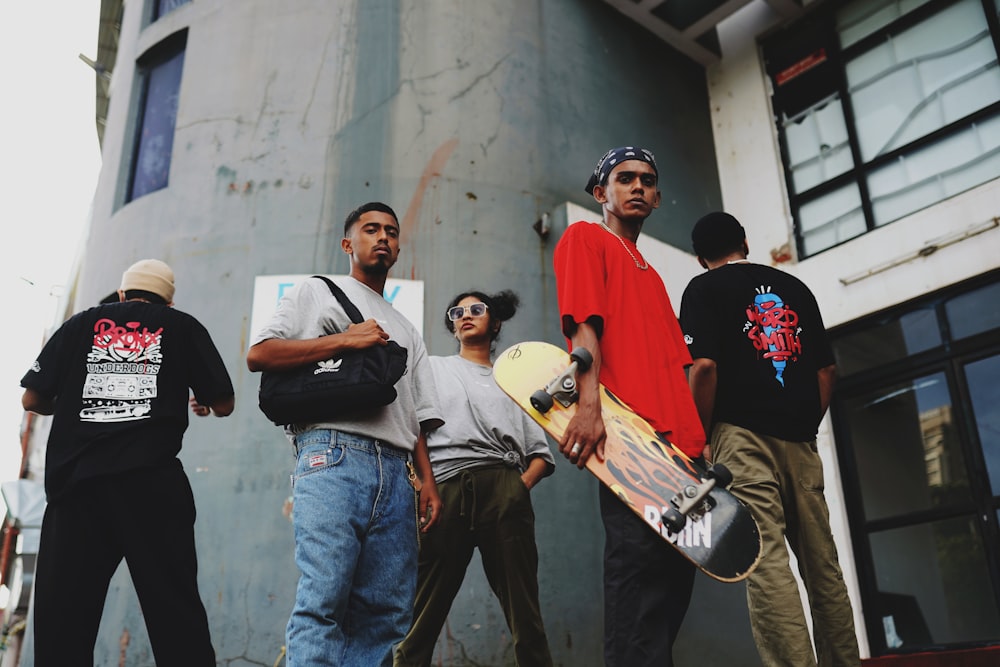 a group of young men standing next to each other