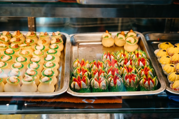 An assortment of colorful pastries displayed on a tray.