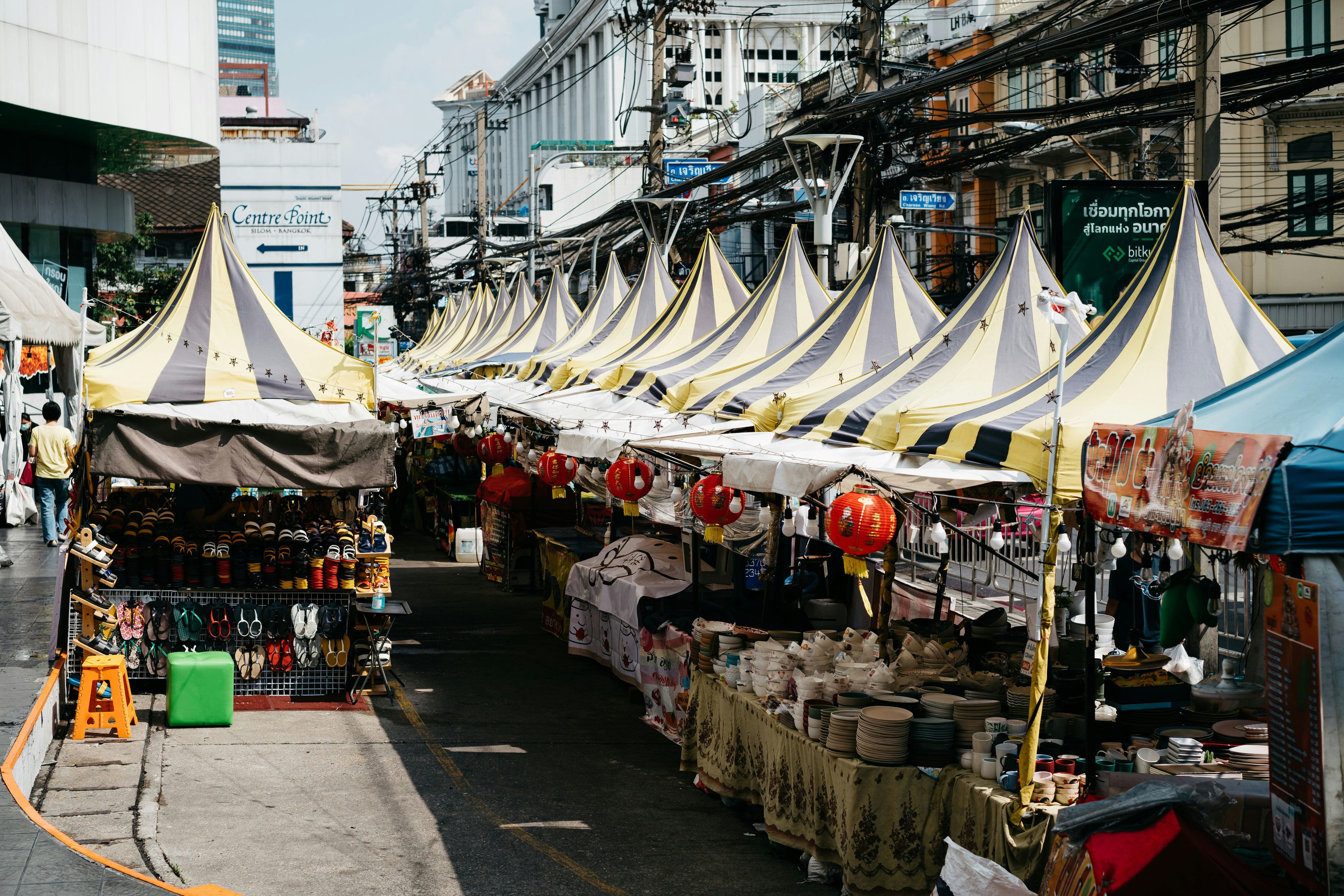 a row of tents sitting next to each other on a street