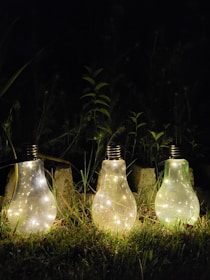 Close-up of modern garden lights integrated seamlessly into a flower bed.