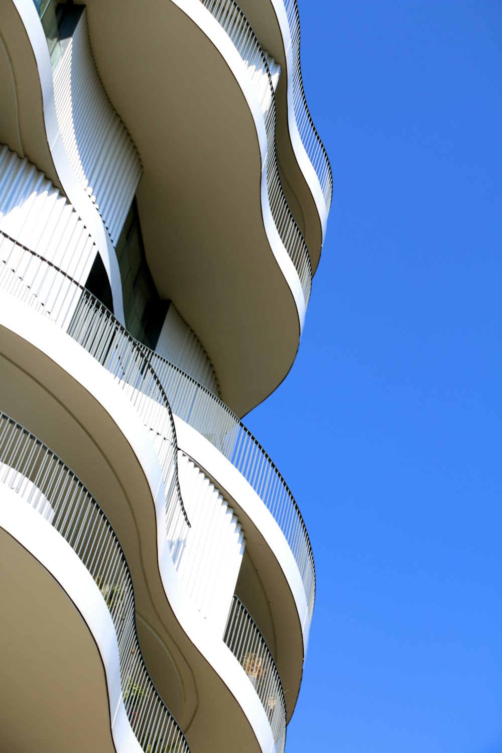 a tall building with balconies and balconies on it