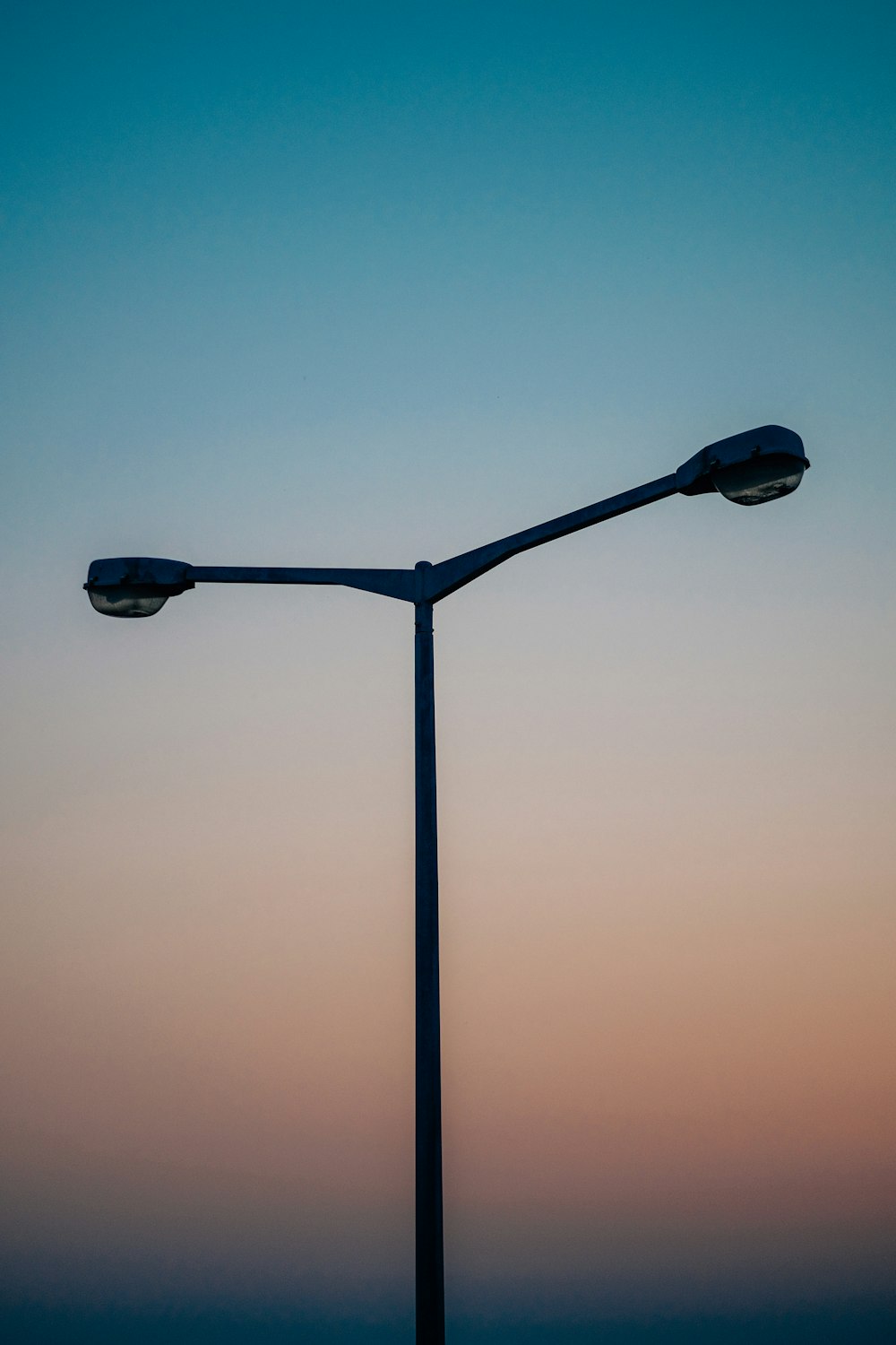 a couple of street lights sitting next to each other