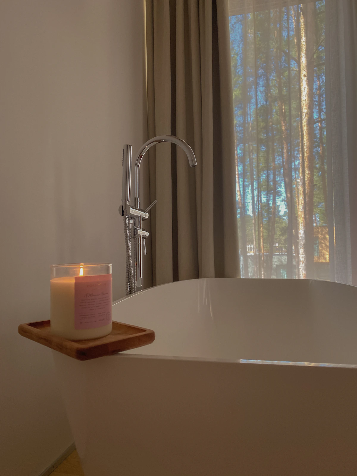 Reed diffuser adding a gentle scent to a small spa bathroom