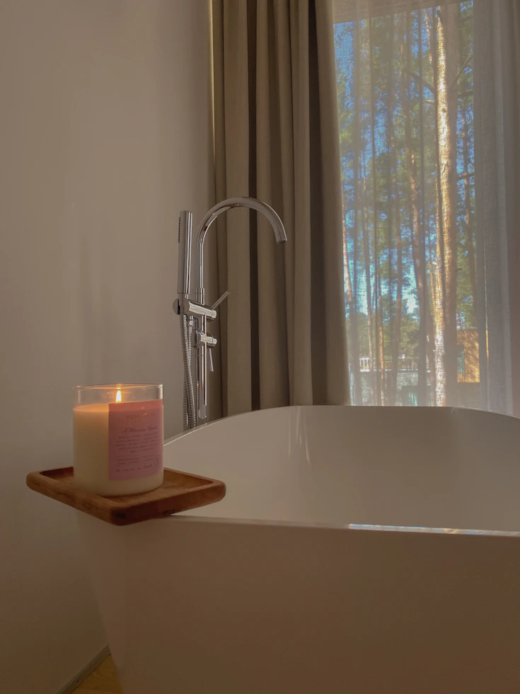 Large White Pillar Candles in Luxury Spa Bathroom 2026