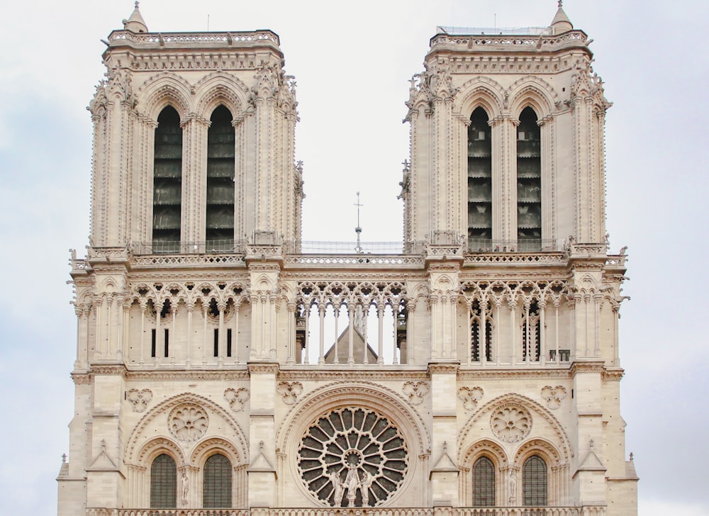 a large cathedral with a clock on the front of it