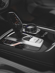 a close up of a steering wheel and a dashboard