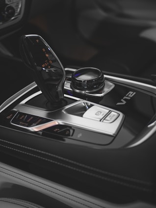 a close up of a steering wheel and a dashboard