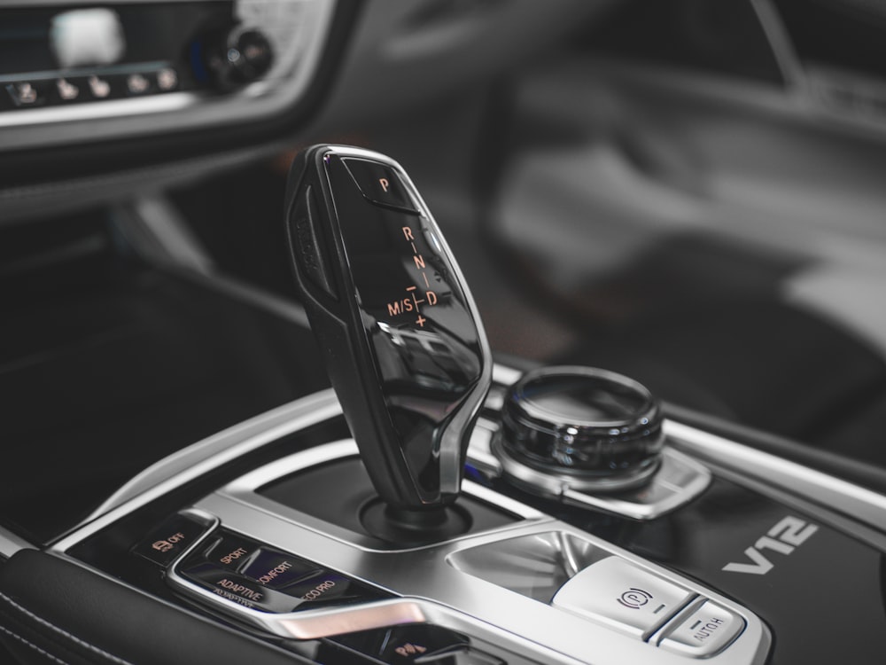 a close up of a car dashboard with a steering wheel