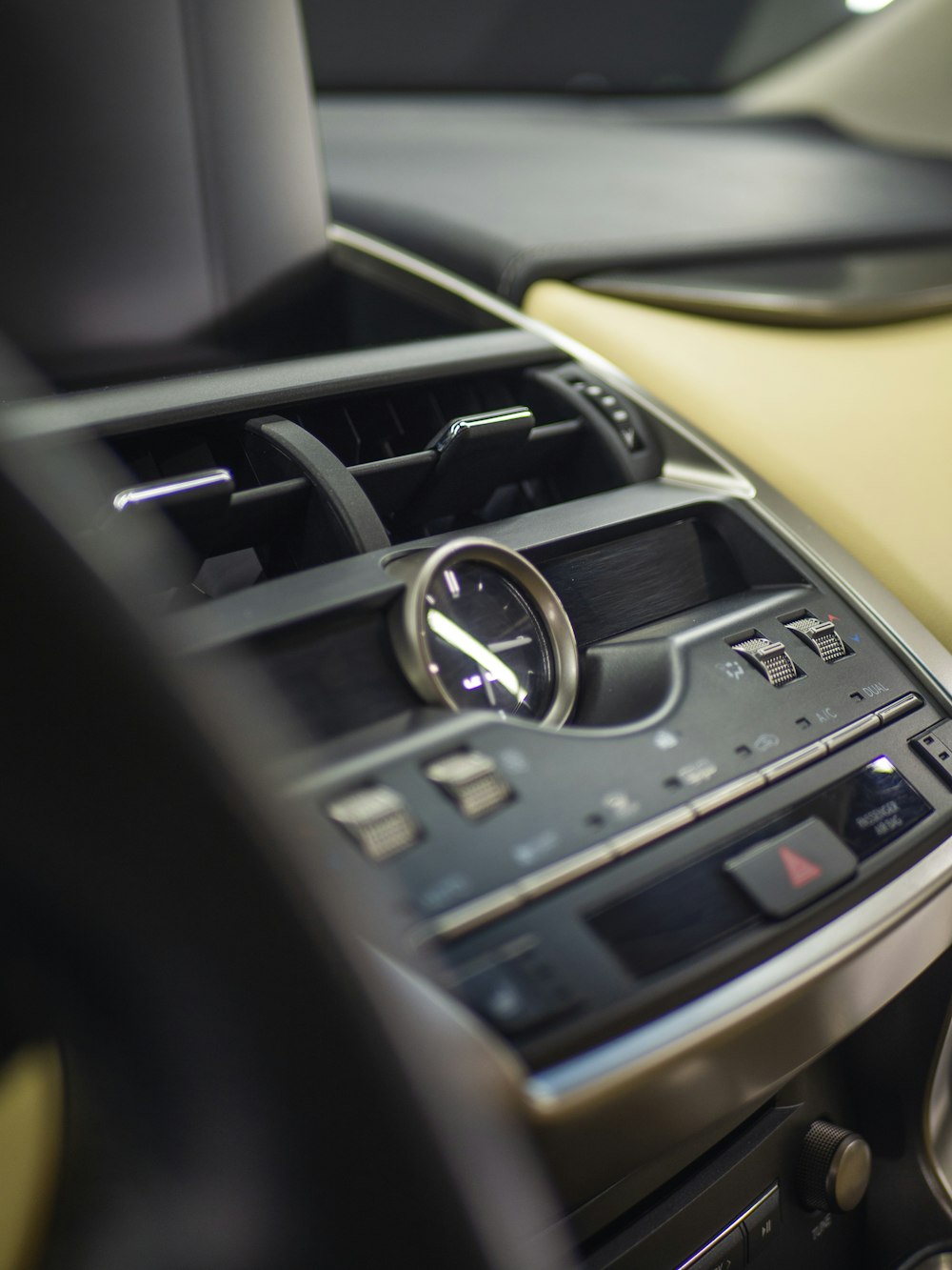 a close up of a car dashboard with a steering wheel