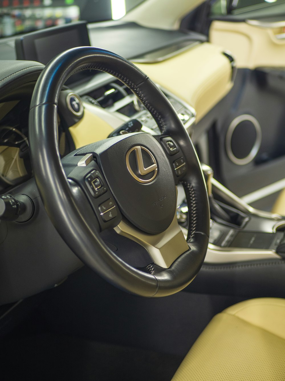 the interior of a car with a steering wheel