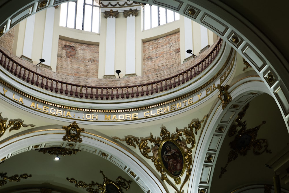 the inside of a building with a clock on the wall