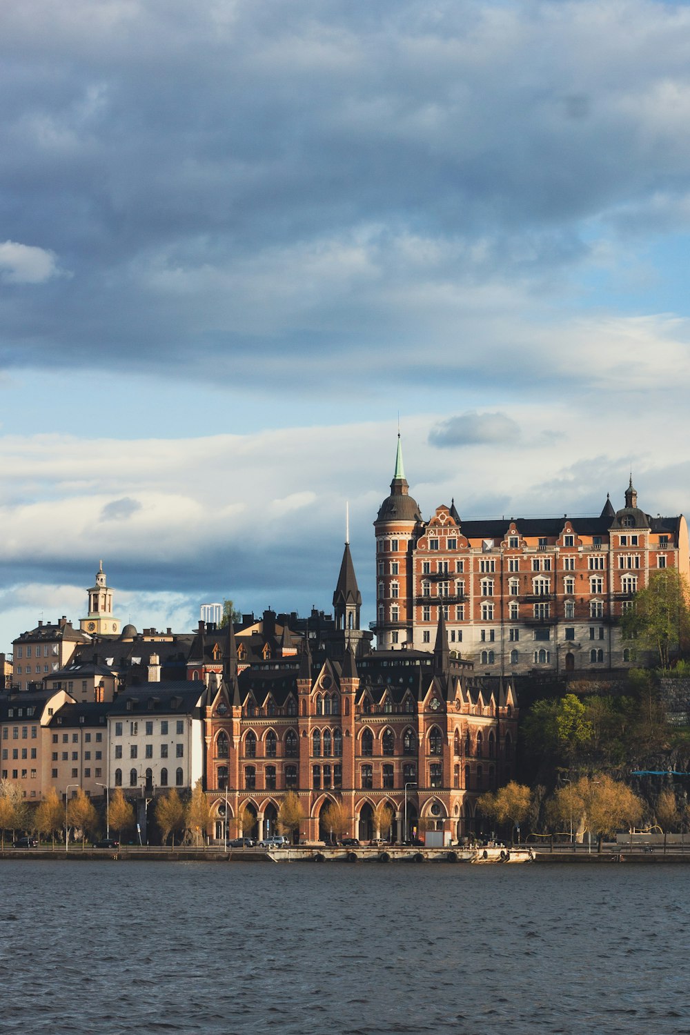 a large building sitting on top of a lake